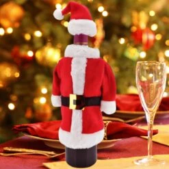 Decopatent® 2 Pièces Ensemble De Pull-over De Bouteille De Vin De Noël - Couverture De Bouteille De Vin De Noël - Décoration De Bouteille De Vin - Costume De Noël De Vin + Chapeau De Père Noël -Decoris Boutique 1200x1200 142