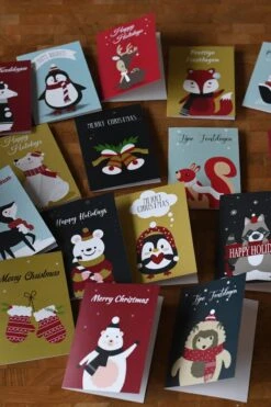 Cartes De Noël - 32 Cartes - 4 Faces / Pliées - 16 Motifs Différents - Cartes De Cartes De Vœux Nouvel An - Incl. Timbre à Cacheter Et Enveloppes C6 -Decoris Boutique 800x1200 3